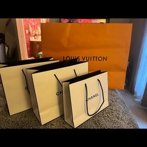 LV and Chanel paper bags